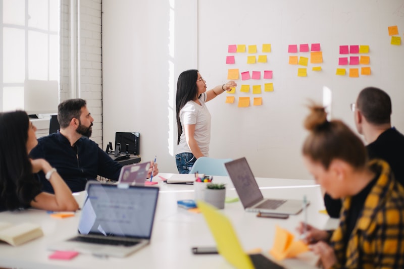 Leaders in a strategic discussion, representing the shift from managing execution to defining intent